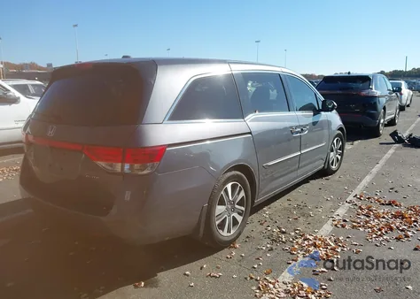 2014 Honda Odyssey Touring/Touring Elite z USA, uszkodzony, nr VIN 5FNRL5H90EB106715